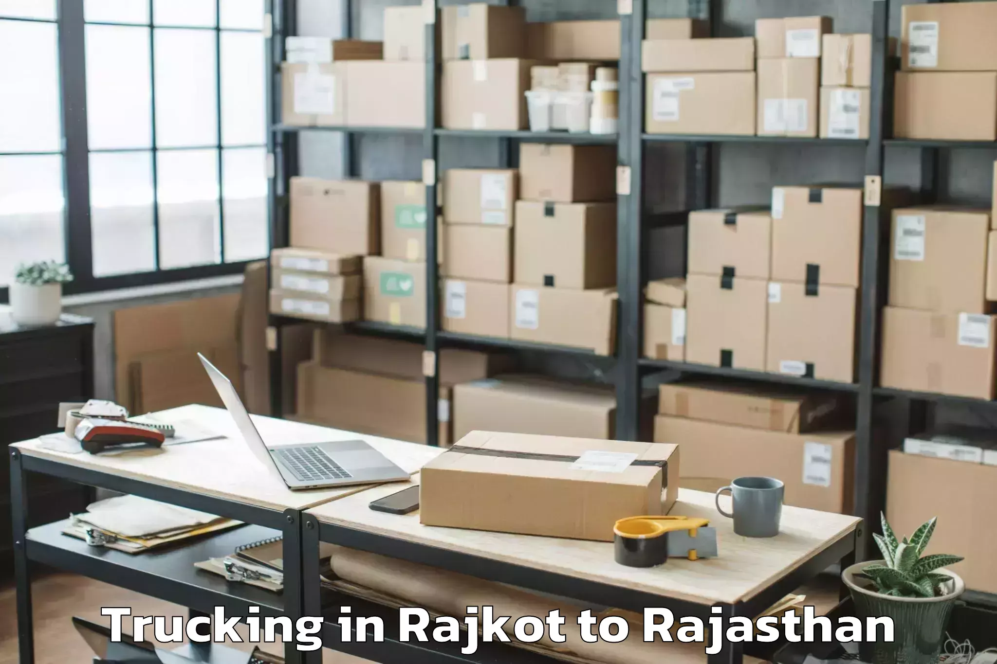 Book Rajkot to Jk Lakshmipat University Jaipu Trucking Online